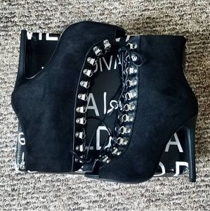 Dolls Kill In The Night Lace-Up Heels.